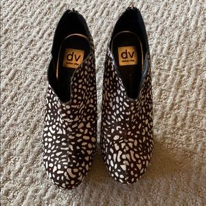 EUC calf hair platform heel boots